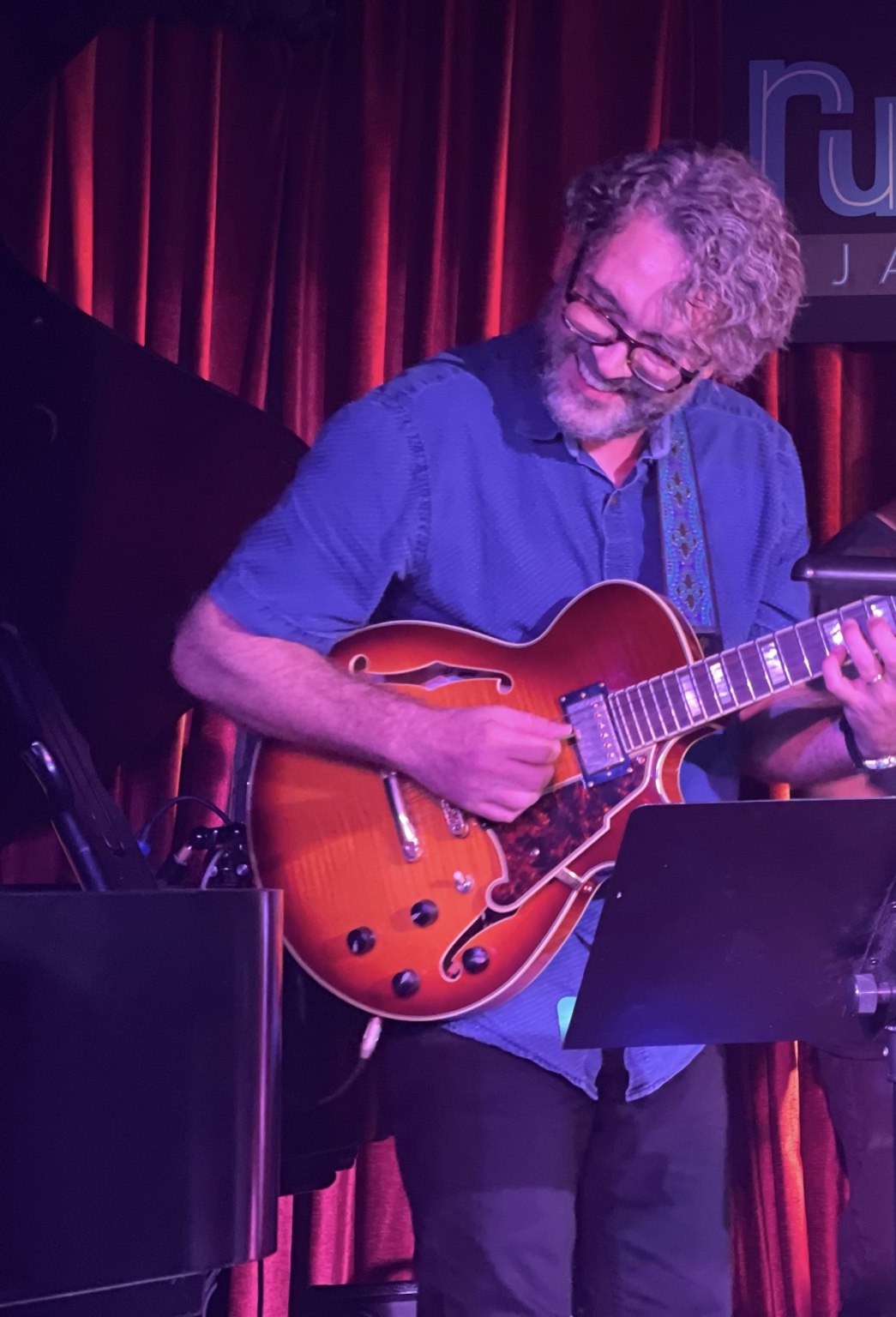 Adam Davis performing live on guitar