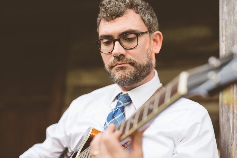 Adam Davis playing guitar